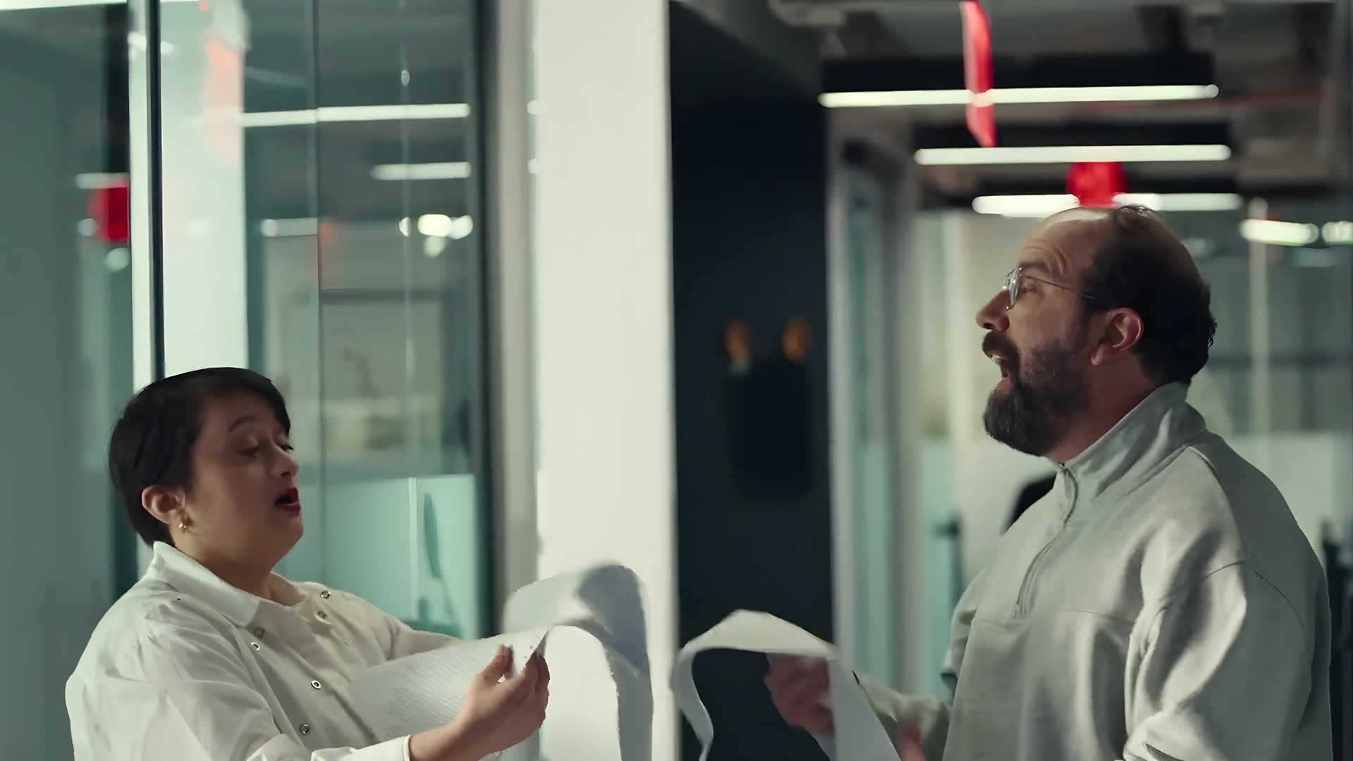 White shirt and quarter-zip, mid-scene