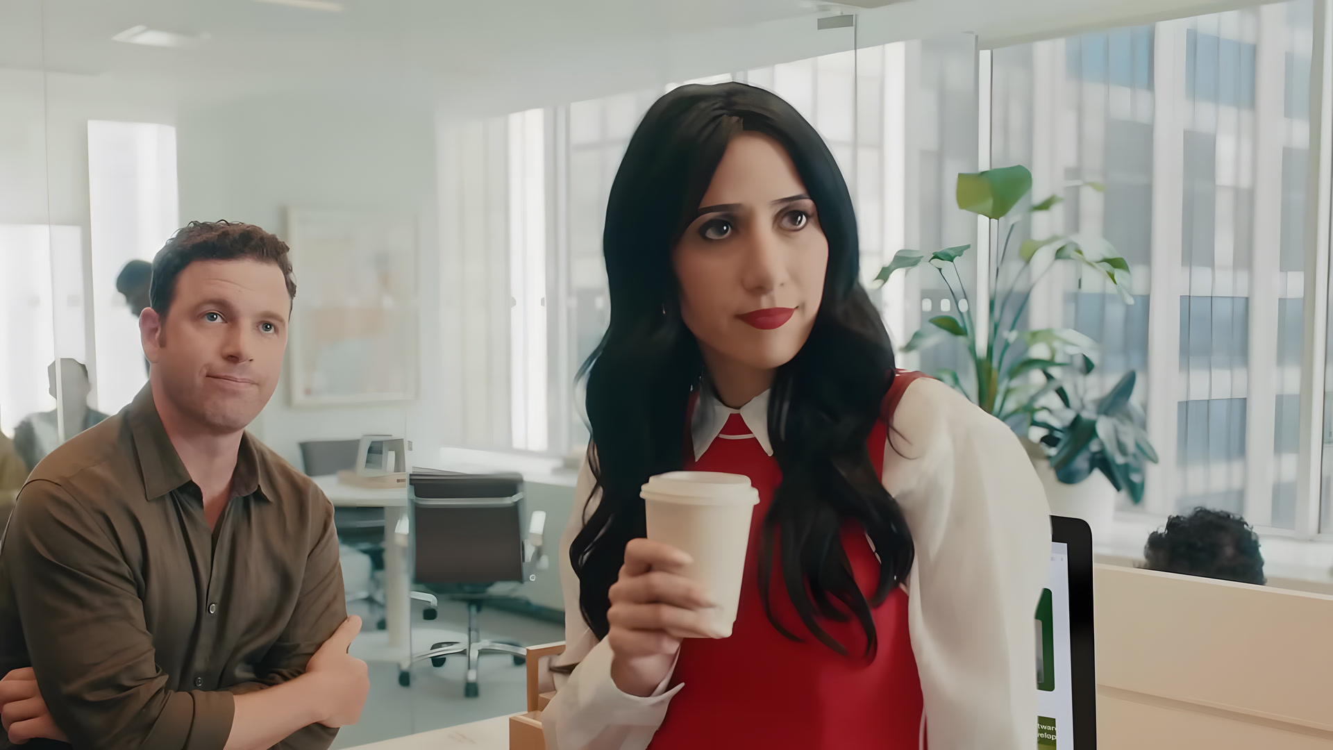 Red vest and white collar in the office